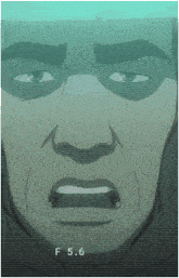 a close up of a man 's face with the letters f5.6 on the bottom right