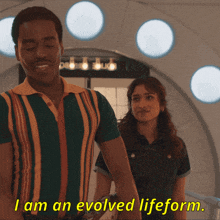 a man and a woman are standing next to each other and the man says i am an evolved lifeform