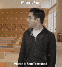 a man standing in a gym with the words where is sam where is sam townsend written below him