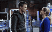 a man and a woman are looking at each other with the words beyond the heroine i tumblr visible