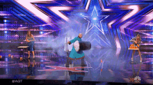 Blowing The Cups Americas Got Talent GIF - Blowing The Cups Americas Got Talent Agt GIFs