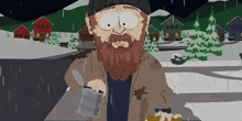 a man with a beard is standing in the rain holding a can .