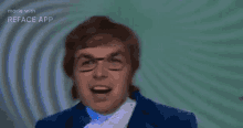 a man wearing glasses and a blue suit is making a funny face .