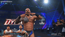 a man with a tattoo on his chest stands in front of a sign that says aew