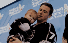 Tanner Pearson Holding Baby GIF - Tanner Pearson Holding Baby La Kings GIFs