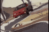a painting of a red car going down a hill with the letter r on it