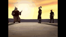 a group of cartoon characters are standing on a ledge with the sun behind them