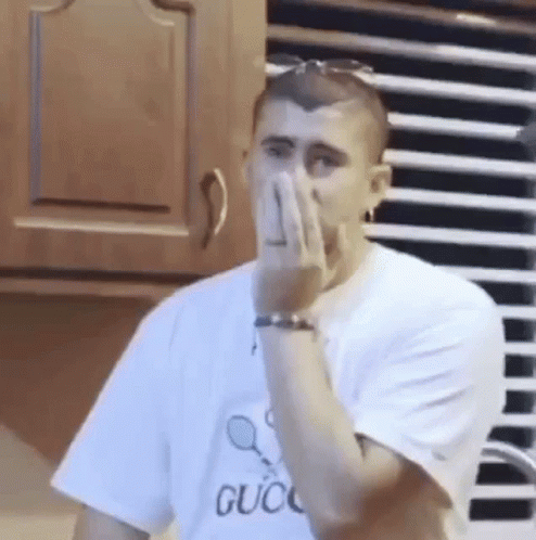 Bad Bunny Awkward GIF - Bad Bunny Awkward Awkward Smile - Discover & Share  GIFs