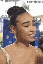 baileybassgifs is written on the bottom of a photo of a woman smiling