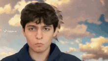 a young man with a cloudy sky in the background and the word viggle.ai on the bottom