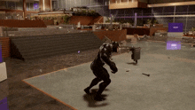 a man in a black suit is standing in a lobby
