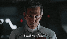 a man says " i will not fail " in a dark room