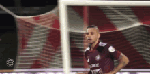 a soccer player wearing a jersey that says force