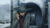 a man with a beard is talking on a phone