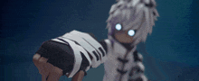 a person with white hair and blue eyes is wearing a black and white striped glove