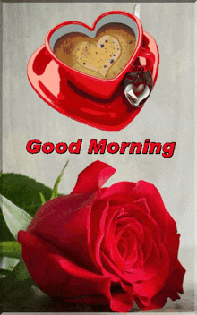 a red rose sits next to a heart shaped coffee cup and saucer