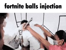 a group of people are getting an injection of fortnite balls