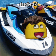 a shedjetski with a yellow face on it