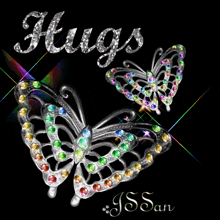 the word hugs is on a black background with two butterflies