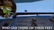 a picture of a cartoon character with the words `` who can think on their feet '' written on it .