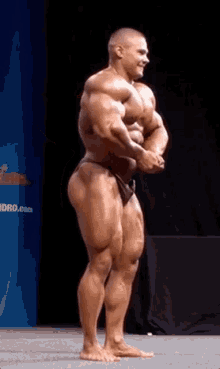 alexey lesukov bodybuilder posing