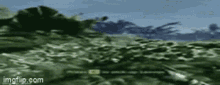 a blurry picture of a person swimming in the ocean