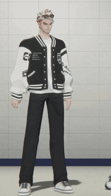 a man wearing a black and white varsity jacket with the number 22 on it