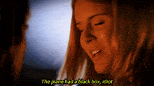 a woman says the plane had a black box idiot in a movie scene