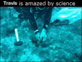a picture of a scuba diver in the ocean with the words travis is amazed by science at the top