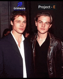 two men are standing next to each other with a project e advertisement behind them