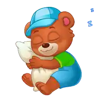 a brown teddy bear wearing a blue hat is hugging a white pillow