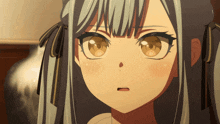a close up of a girl 's face with her mouth open