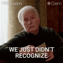 an older man is holding a piece of paper and saying we just did n't recognize
