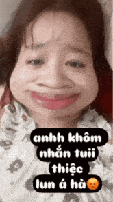 a woman is making a funny face with the words anh khom nhan tuii thiec lun a ha