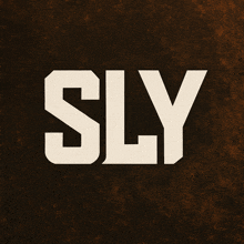 a brown background with the word sly in white