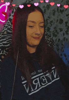 a woman wearing a shirt that says ' i ' and ' i ' on it