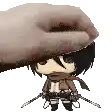a hand is holding a small anime character with a scarf around his neck .