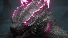 a close up of a monster with pink lights coming out of its eyes