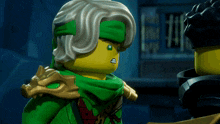 a close up of a lego figure with a sword