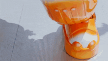 a shadow of a person is cast on a yellow object