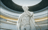 a statue of a man in a white suit with a sword