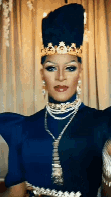 drag queen drag race canada tynomi banks pose crown