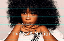a woman with curly hair and the words i < 3 sza nation on the bottom