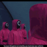 a large group of people are gathered in a room and one of them is talking to another man .