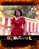 a woman in a red saree is surrounded by flames and the words " black "