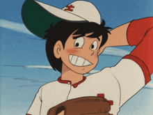 a boy wearing a baseball cap with the letter t on it