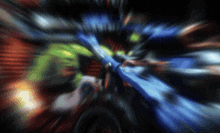 a blurred image of a person 's face with a green and blue glow
