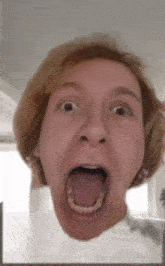 a woman making a funny face with her tongue out