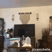 a picture of a living room with the name kiramichelle on the bottom right