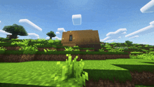 a small house sits on top of a grassy hill in a minecraft world